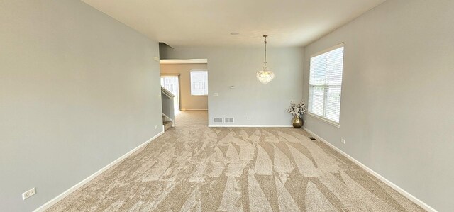 1793 Lanyon Dr, Bartlett, IL 60103 - unfurnished room with carpet flooring and stairs