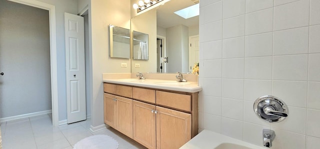 1793 Lanyon Dr, Bartlett, IL 60103 - bathroom with a skylight, tile patterned floors, and double vanity