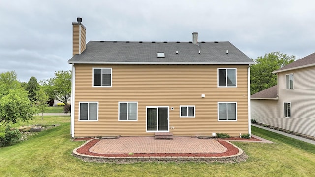 1793 Lanyon Dr, Bartlett, IL 60103 - back of property with a patio, a yard, and a chimney