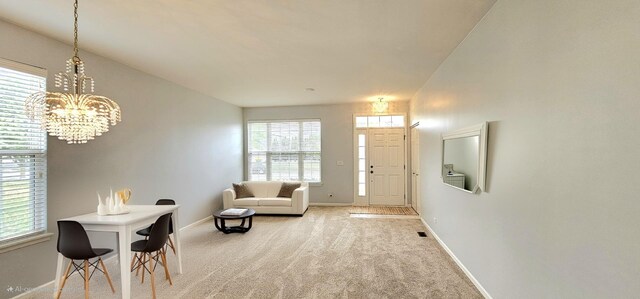 1793 Lanyon Dr, Bartlett, IL 60103 - foyer entrance with a chandelier and carpet