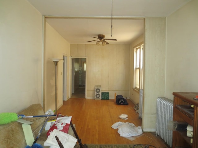 1642 W Olive Ave, Chicago, IL 60660 - dining room with radiator, wood finished floors, and ceiling fan