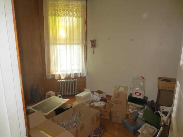 1642 W Olive Ave, Chicago, IL 60660 - misc room with radiator and wood finished floors