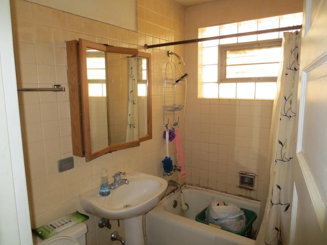 1642 W Olive Ave, Chicago, IL 60660 - full bathroom featuring tile walls and shower / bath combo with shower curtain