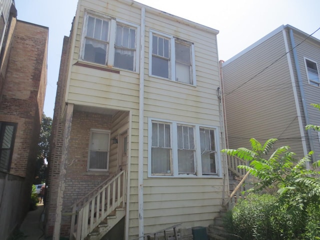1642 W Olive Ave, Chicago, IL 60660 - rear view of house featuring stairs