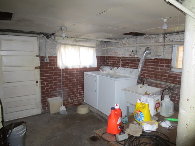 1642 W Olive Ave, Chicago, IL 60660 - washroom with independent washer and dryer and brick wall