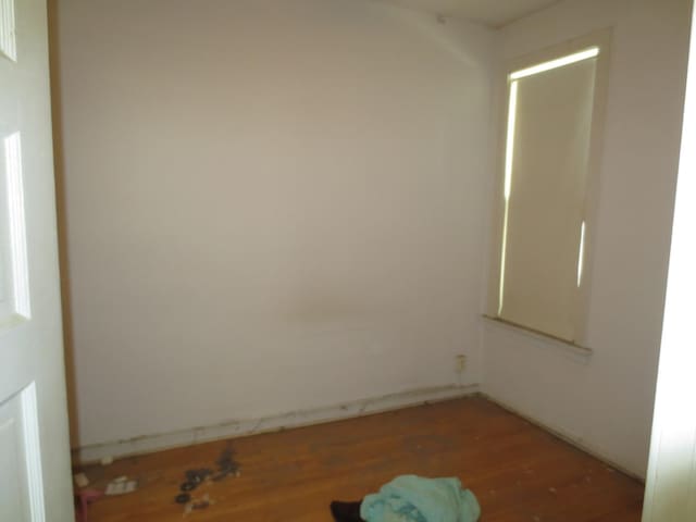 1642 W Olive Ave, Chicago, IL 60660 - spare room featuring wood finished floors