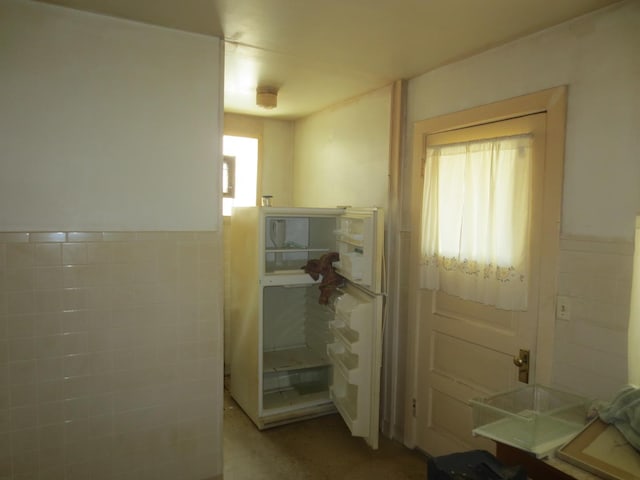1642 W Olive Ave, Chicago, IL 60660 - bathroom featuring a wainscoted wall and tile walls
