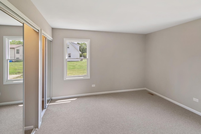 4117 186th Pl, Country Club Hills, IL 60478 - carpeted empty room with plenty of natural light