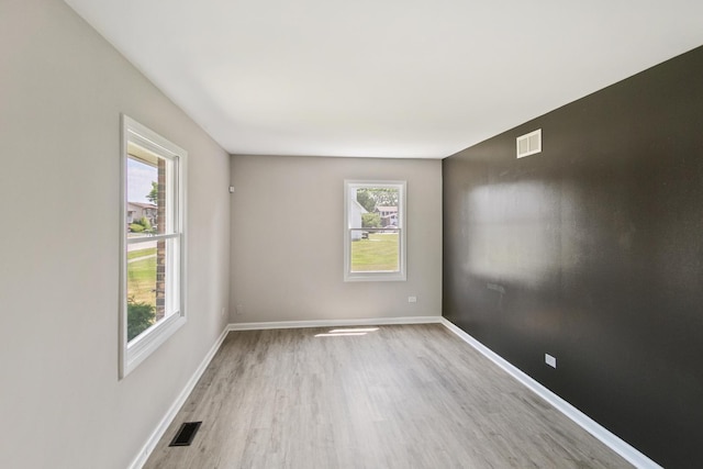 4117 186th Pl, Country Club Hills, IL 60478 - empty room featuring wood finished floors and plenty of natural light