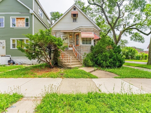 7959 S Coles Ave, Chicago, IL 60617 - view of front of property featuring stone siding