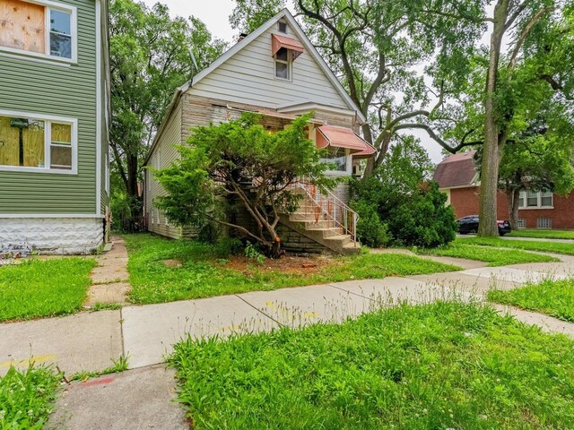 7959 S Coles Ave, Chicago, IL 60617 - view of front of home featuring stairs