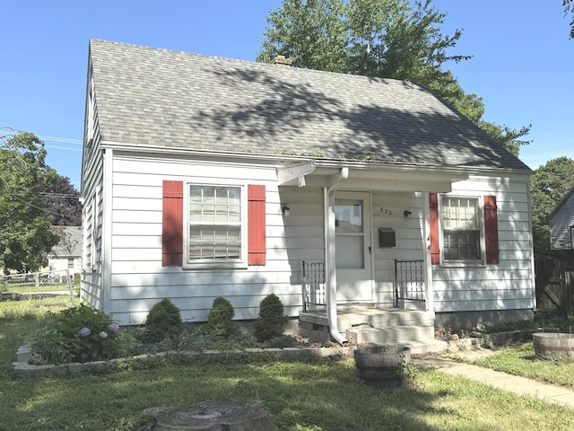 822 N 12th St, Rochelle, IL 61068 - view of front of property featuring roof with shingles