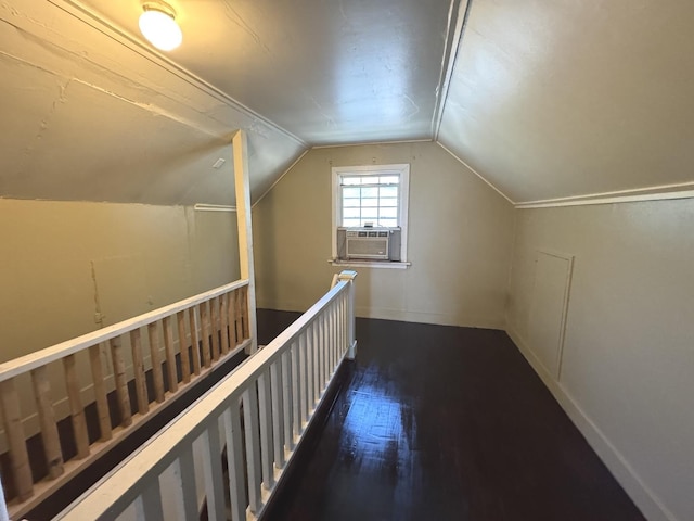 822 N 12th St, Rochelle, IL 61068 - bonus room with cooling unit, vaulted ceiling, and wood finished floors