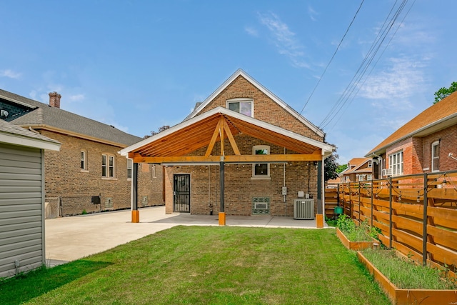 1833 Cuyler Ave, Berwyn, IL 60402 - rear view of property with brick siding, a patio area, a gazebo, a vegetable garden, and a fenced backyard