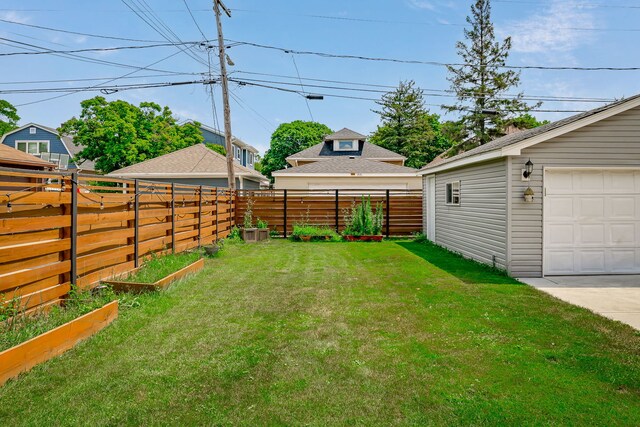 1833 Cuyler Ave, Berwyn, IL 60402 - fenced backyard with a garden and a garage