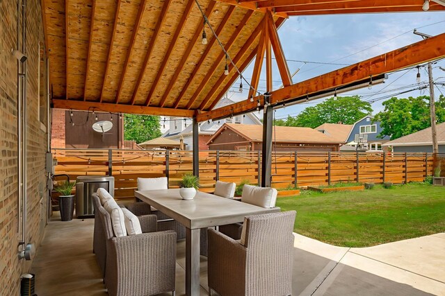 1833 Cuyler Ave, Berwyn, IL 60402 - fenced backyard with outdoor dining space and a patio area