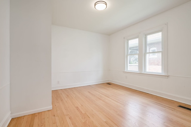 1833 Cuyler Ave, Berwyn, IL 60402 - spare room with wood finished floors and baseboards