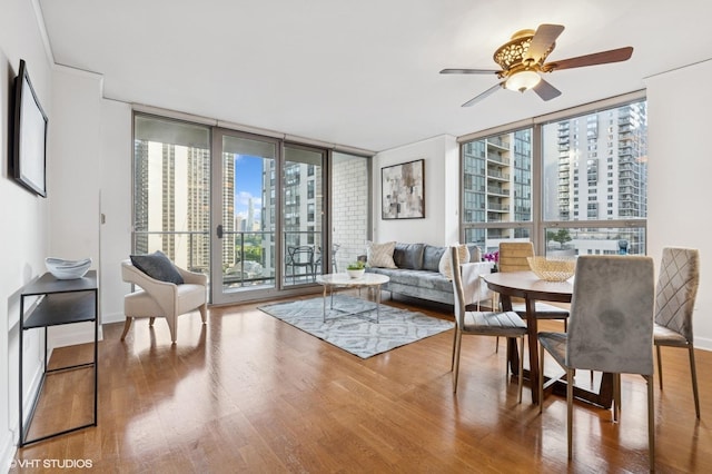 420 E Waterside Dr Unit 1103, Chicago, IL 60601 - dining area featuring a city view, wood finished floors, floor to ceiling windows, and ceiling fan