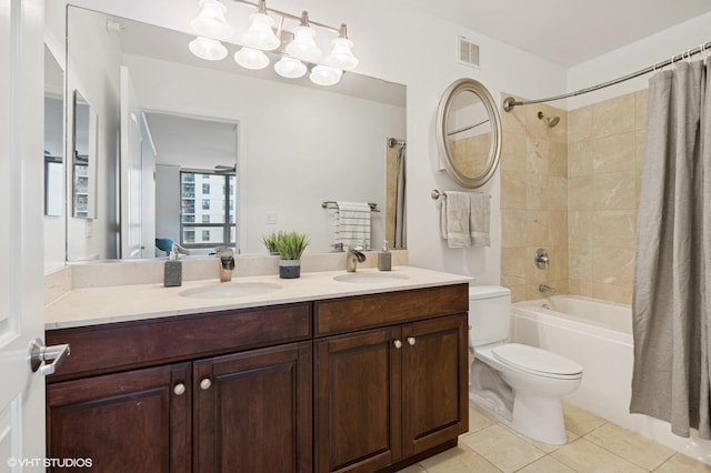 420 E Waterside Dr Unit 1103, Chicago, IL 60601 - bathroom featuring shower / bath combo with shower curtain, double vanity, and tile patterned floors