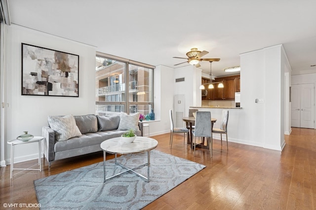 420 E Waterside Dr Unit 1103, Chicago, IL 60601 - living room featuring ceiling fan and wood finished floors