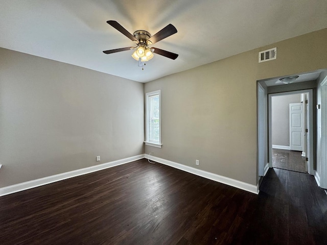 11022 S Vernon Ave, Chicago, IL 60628 - unfurnished room featuring dark wood-type flooring and a ceiling fan