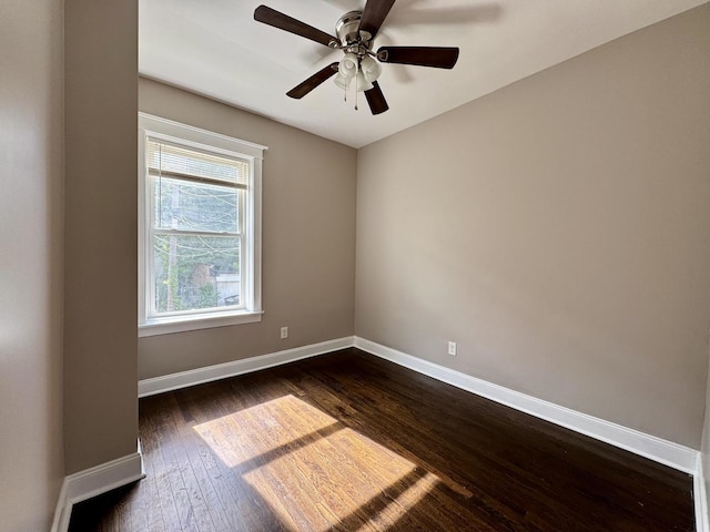 11022 S Vernon Ave, Chicago, IL 60628 - empty room featuring dark wood-style flooring and ceiling fan