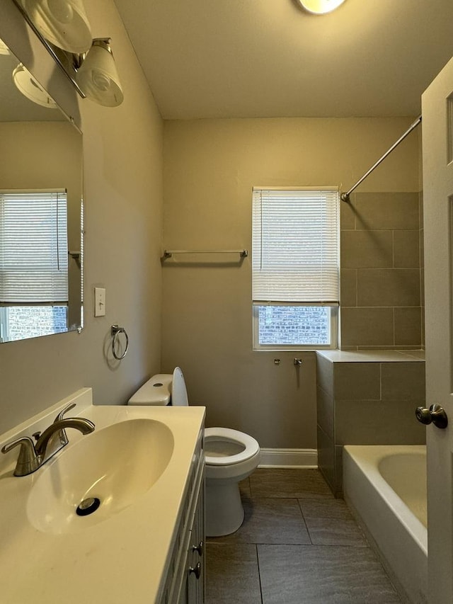 11022 S Vernon Ave, Chicago, IL 60628 - full bathroom featuring tile patterned flooring, plenty of natural light, vanity, and tub / shower combination