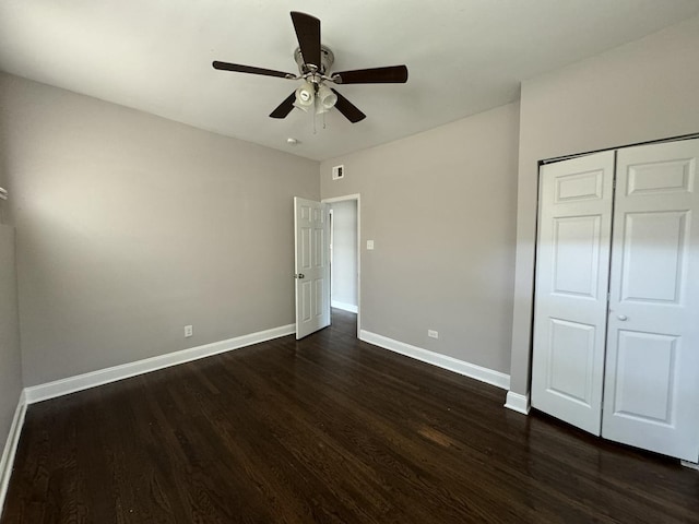 11022 S Vernon Ave, Chicago, IL 60628 - unfurnished bedroom featuring dark wood finished floors, a closet, and ceiling fan
