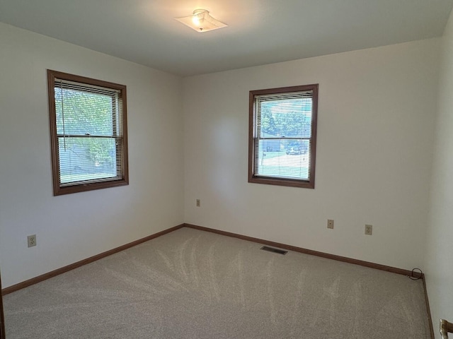 532 E 2nd St, Herscher, IL 60941 - unfurnished room featuring healthy amount of natural light and light colored carpet