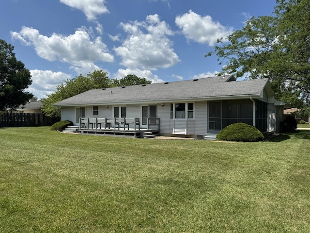 532 E 2nd St, Herscher, IL 60941 - back of property with a deck, a sunroom, and roof with shingles