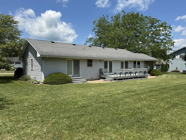 532 E 2nd St, Herscher, IL 60941 - rear view of house with a lawn and a deck