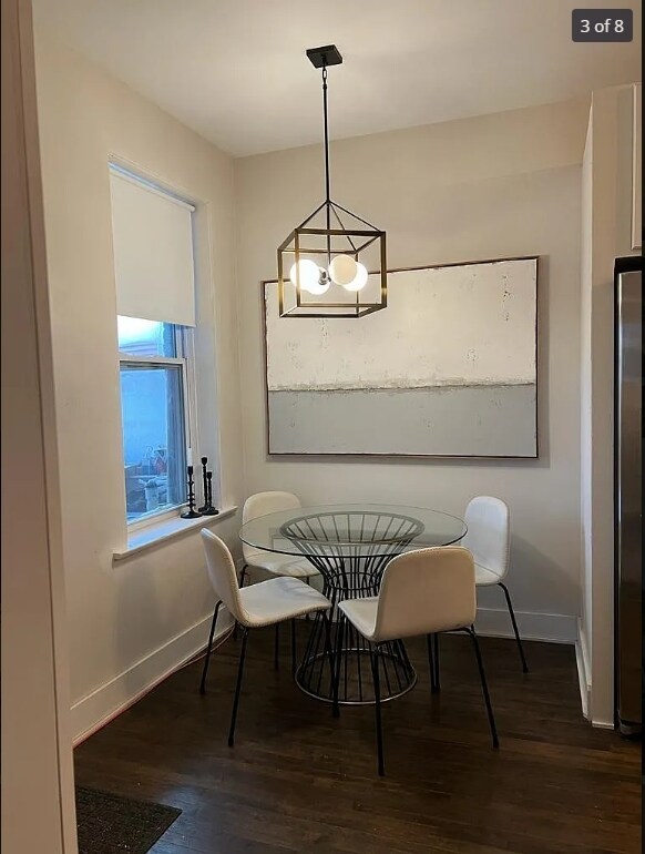 1634 W 38th St, Chicago, IL 60609 - dining space featuring baseboards and wood finished floors