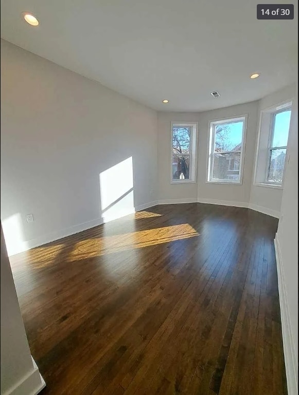 1634 W 38th St, Chicago, IL 60609 - spare room with dark wood-style floors and recessed lighting
