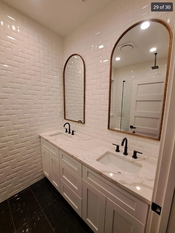 1634 W 38th St, Chicago, IL 60609 - full bathroom featuring tile walls, tile patterned flooring, double vanity, a tile shower, and backsplash