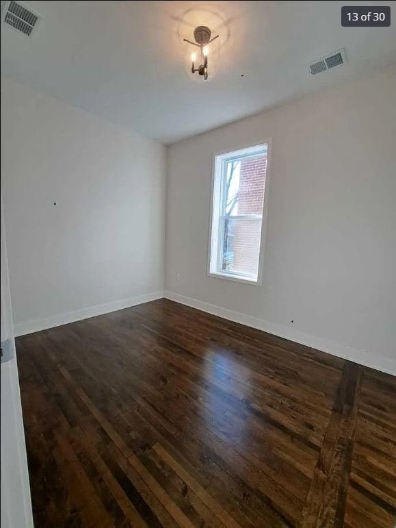 1634 W 38th St, Chicago, IL 60609 - spare room with wood-type flooring