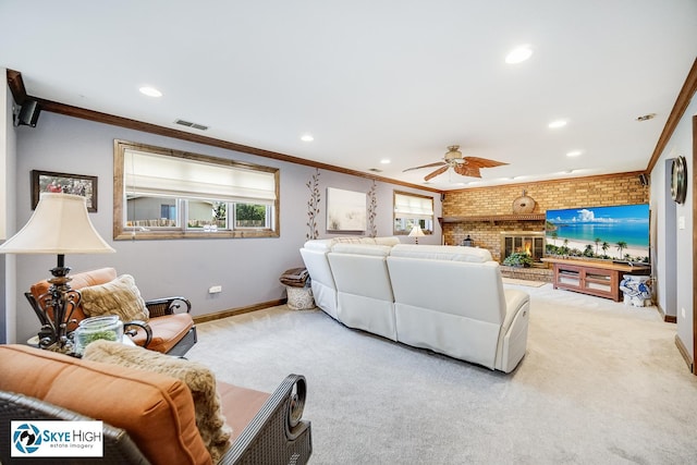 14463 S Canvasback Ct, Homer Glen, IL 60491 - living room featuring ornamental molding, light carpet, ceiling fan, recessed lighting, and a brick fireplace