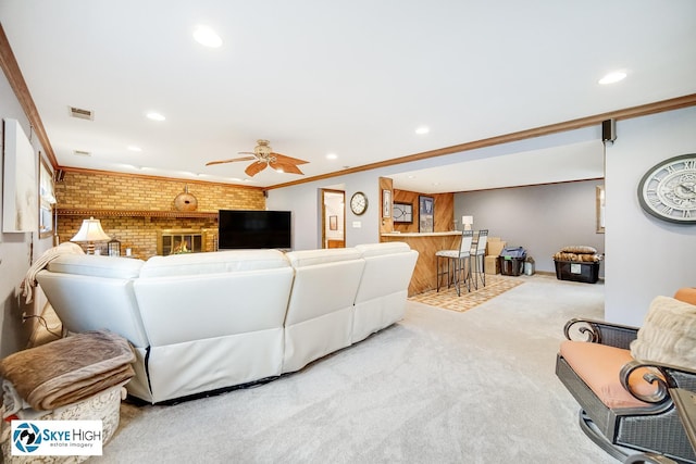 14463 S Canvasback Ct, Homer Glen, IL 60491 - carpeted living area with recessed lighting, ceiling fan, crown molding, a fireplace, and bar area