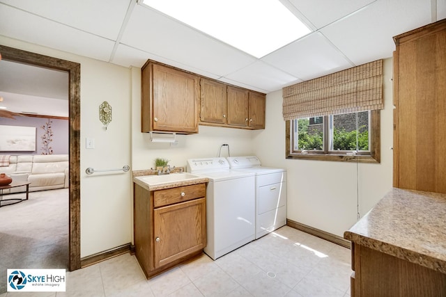 14463 S Canvasback Ct, Homer Glen, IL 60491 - washroom with washer and clothes dryer, cabinet space, ceiling fan, and light tile patterned floors