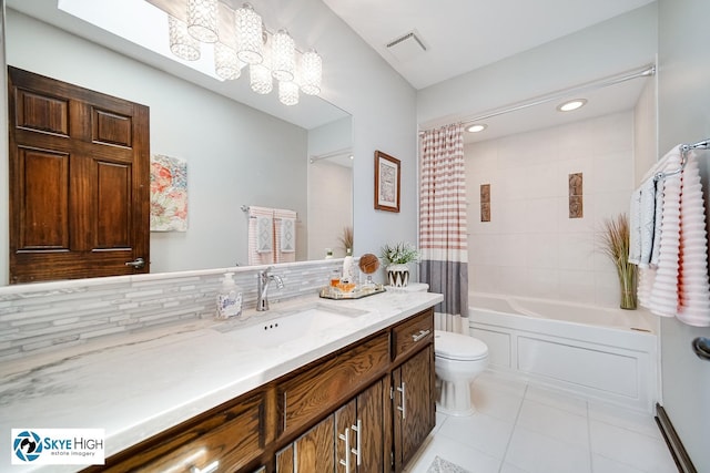 14463 S Canvasback Ct, Homer Glen, IL 60491 - bathroom featuring tile patterned flooring, vanity, shower / bath combo, and tasteful backsplash