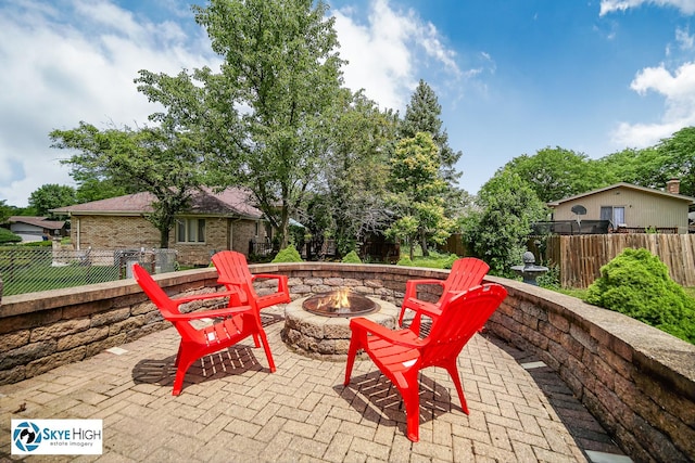 14463 S Canvasback Ct, Homer Glen, IL 60491 - view of patio with an outdoor fire pit