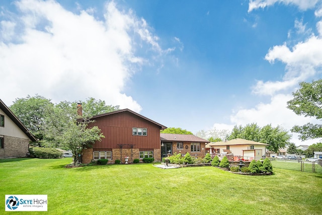 14463 S Canvasback Ct, Homer Glen, IL 60491 - rear view of house with brick siding and a chimney