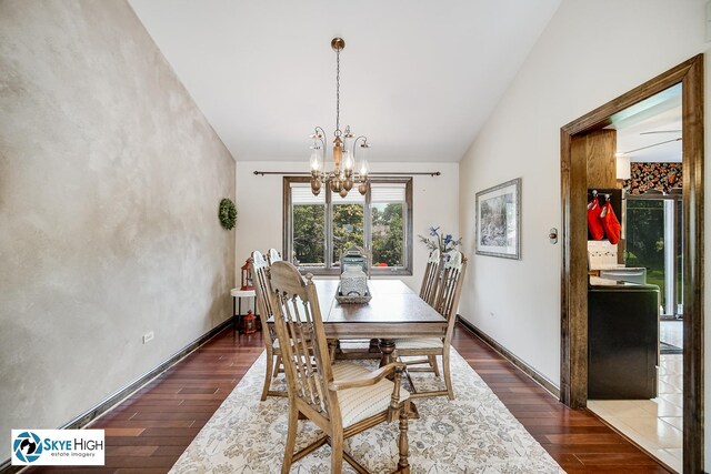 14463 S Canvasback Ct, Homer Glen, IL 60491 - dining space featuring wood finished floors, a chandelier, and lofted ceiling