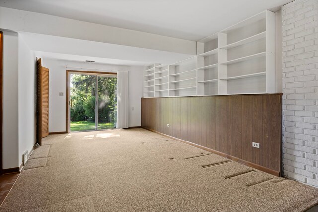 5245 Fairmount Ave, Downers Grove, IL 60515 - unfurnished room with carpet floors and wood walls