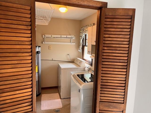 5245 Fairmount Ave, Downers Grove, IL 60515 - washroom with washer and dryer and baseboards