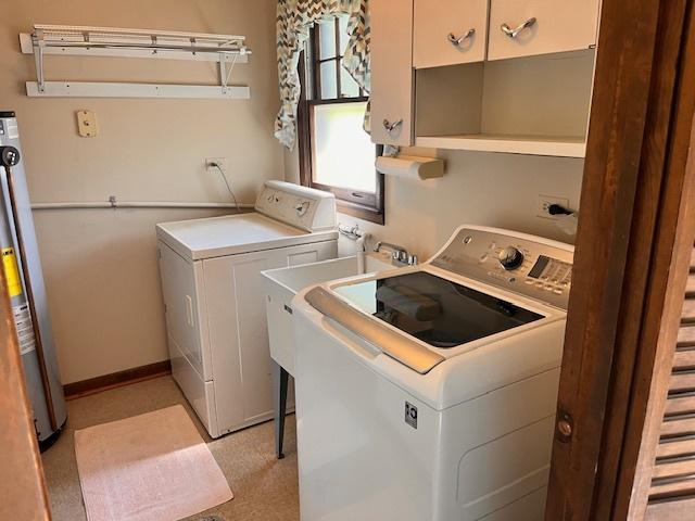 5245 Fairmount Ave, Downers Grove, IL 60515 - laundry room with separate washer and dryer and cabinet space