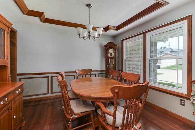 3003 Providence Dr, Bloomington, IL 61704 - dining space featuring a chandelier, dark wood-type flooring, crown molding, and a textured ceiling