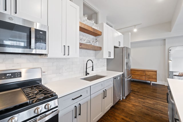 165 N Canal St Unit 1219, Chicago, IL 60606 - kitchen with stainless steel appliances, open shelves, tasteful backsplash, light countertops, and dark wood-style flooring