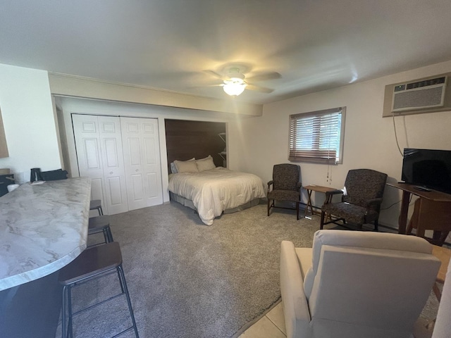 45 Nassau Colony Unit 4, Fox Lake, IL 60020 - bedroom with a wall mounted air conditioner, a closet, ceiling fan, and carpet