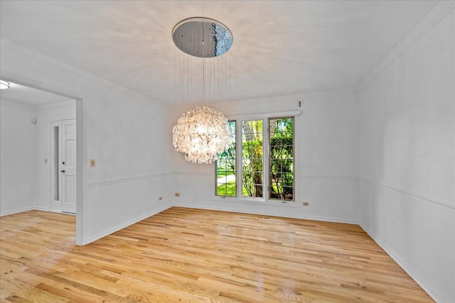 1280 Lawrence Ave, Lake Forest, IL 60045 - spare room featuring a chandelier, wood finished floors, and crown molding