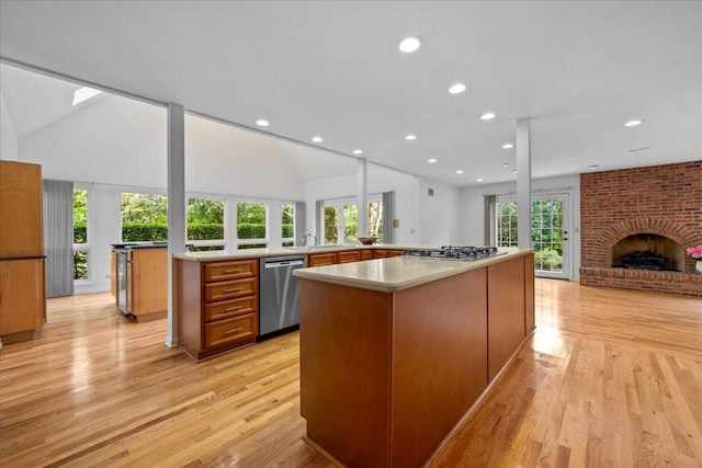 1280 Lawrence Ave, Lake Forest, IL 60045 - kitchen featuring appliances with stainless steel finishes, open floor plan, a large island, light wood-type flooring, and recessed lighting